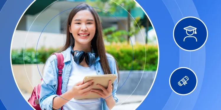 Happy student with a backpack and headphones holding a tablet on an outdoor university campus.