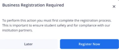 Business Registration Required pop-up notification with compliance information and a Register Now button.