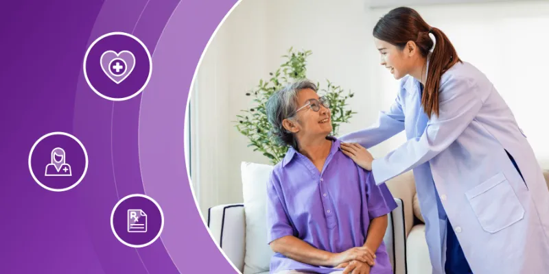 A healthcare worker supporting a smiling senior woman in a home care setting.
