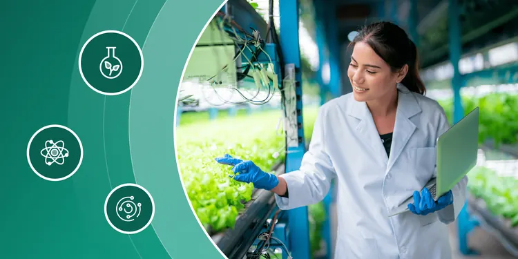 Female scientist in a lab coat holding a laptop while inspecting plants in an indoor vertical farm, next to science icons.