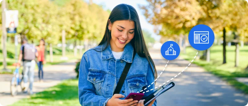 A smiling young woman in a denim jacket looking at her smartphone while walking outdoors on a campus path, with graphic icons of a school building and a dashboard interface connected to her phone.